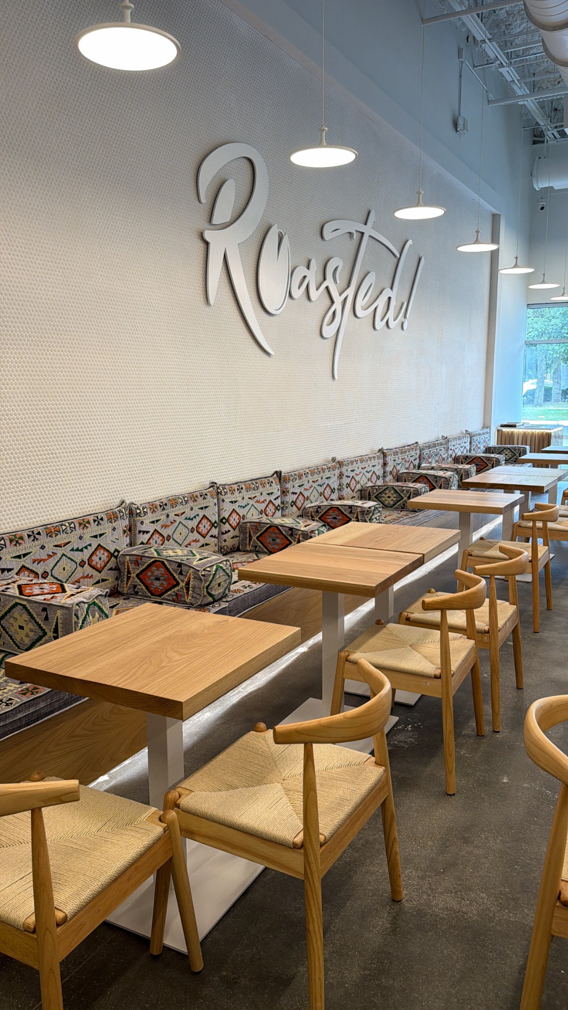 Roasted Coffee Shop seating and feature wall