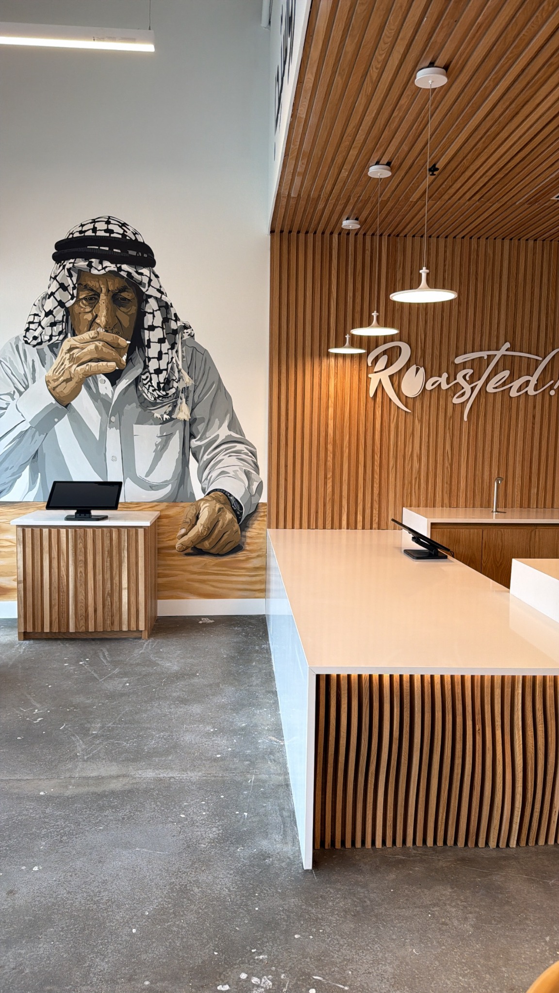 Roasted Coffee Shop mural and counter detail